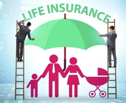 Two businessmen on ladders under a large 'Life Insurance' umbrella protecting a family icon.